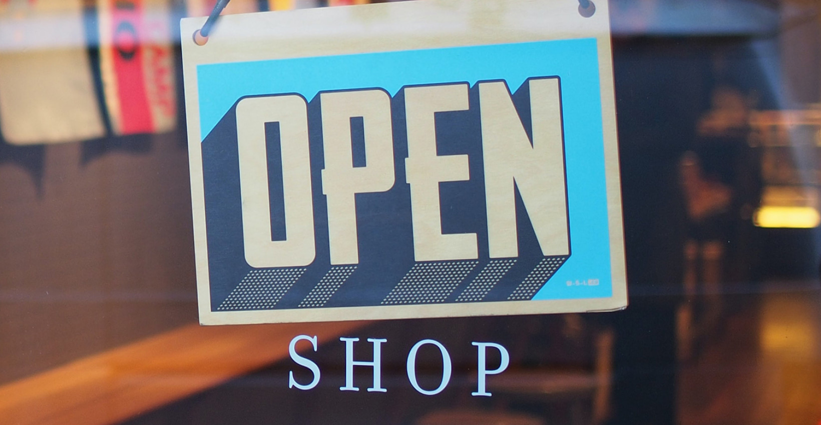 An open sign on a storefront