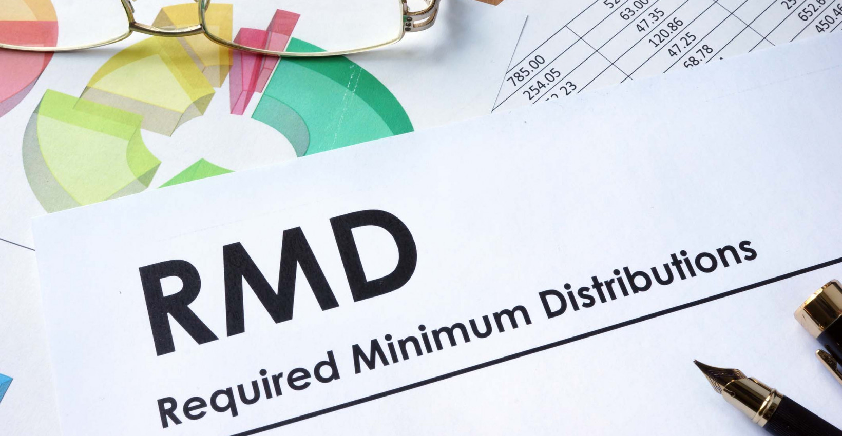 Glasses laying on a sheet of paper that says "RMD"