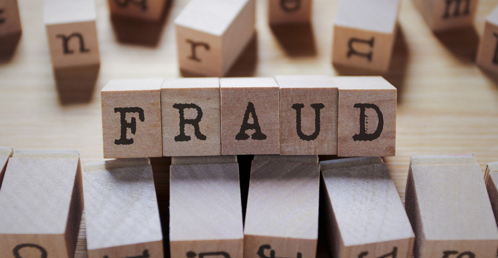block letters spelling out fraud