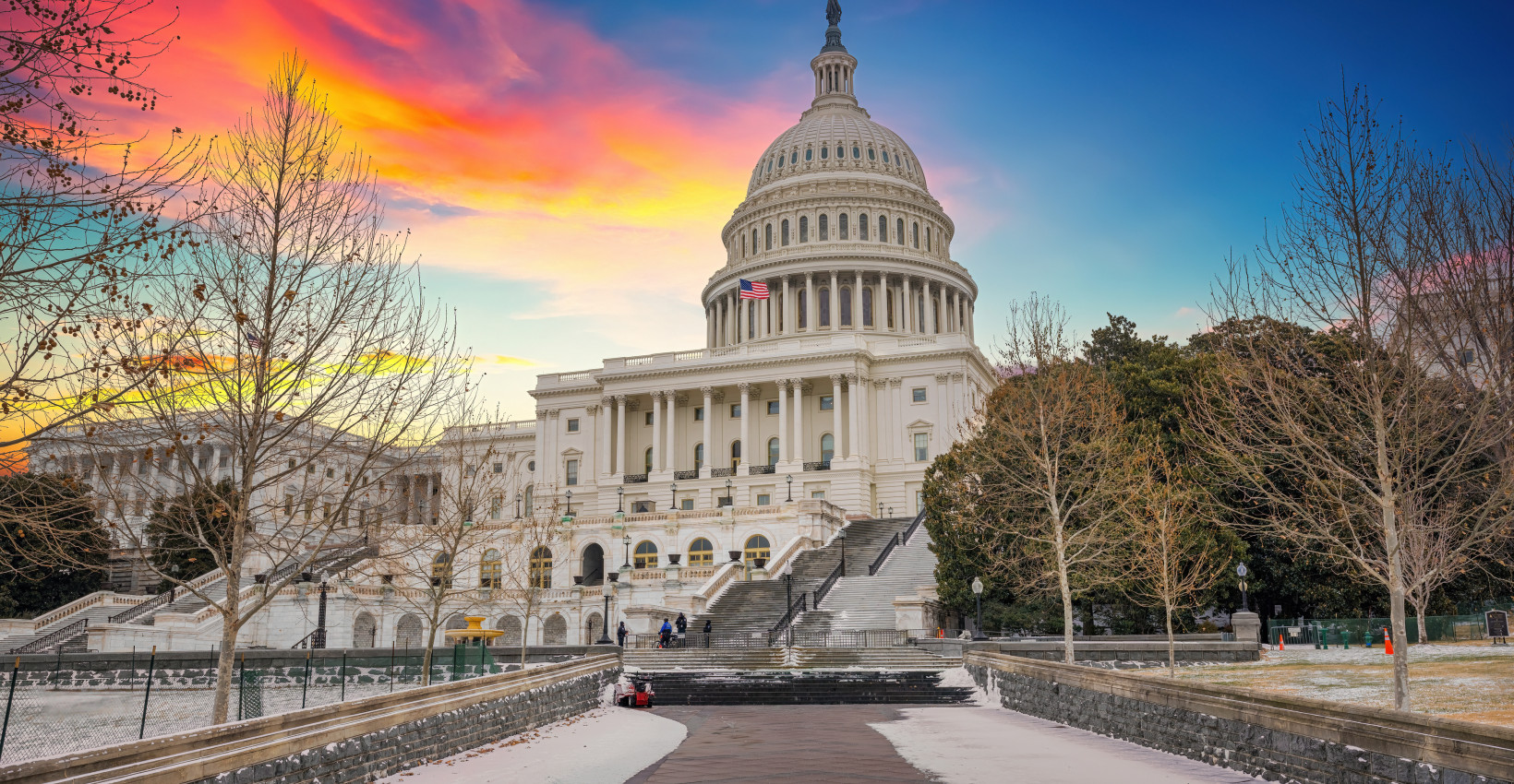 A picture of the US Capitol building at sunset