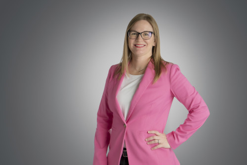 A headshot of Andrea Howard