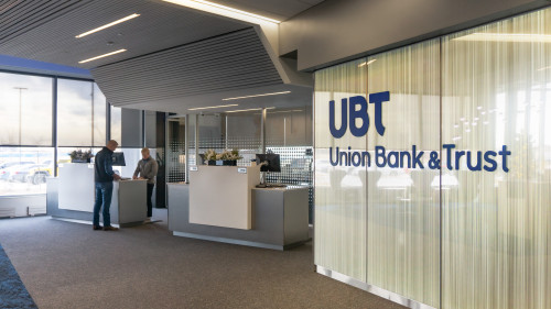 UBT employees working with a customer in an Omaha branch location