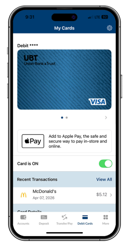A UBT debit card in a mobile wallet on iPhone