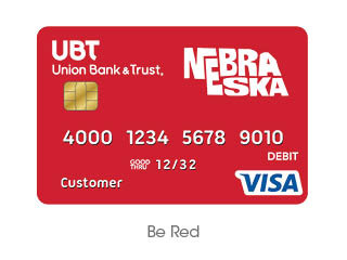 red background with the word nebraska in white in the shape of nebraska debit card