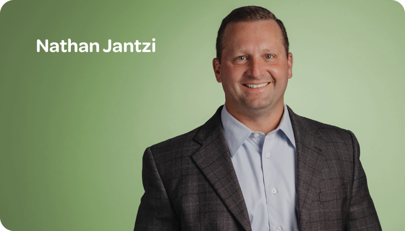 Nathan Jantzi headshot green background