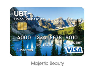 mountains behind a lake debit card