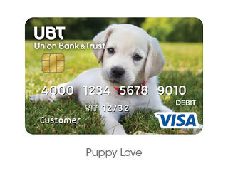 white puppy in the grass debit card