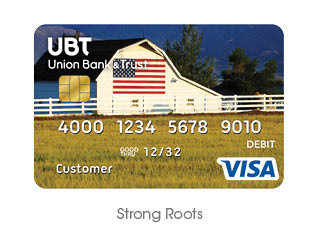 an american flag on a white barn debit card