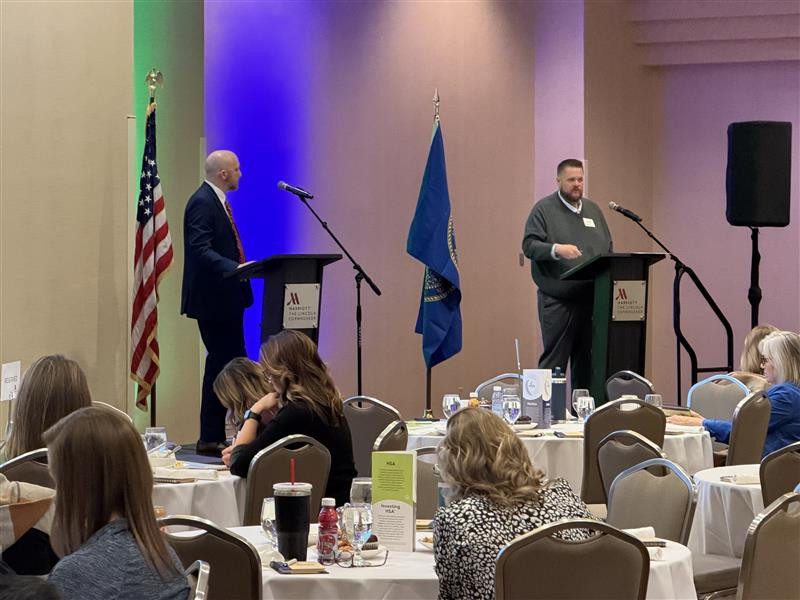 Jeremy Christensen and Eli Crittenden speak at the omnify benefits forum