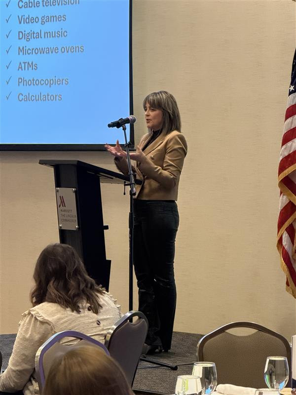 Sherry Lawton speaks at the omnify benefits forum