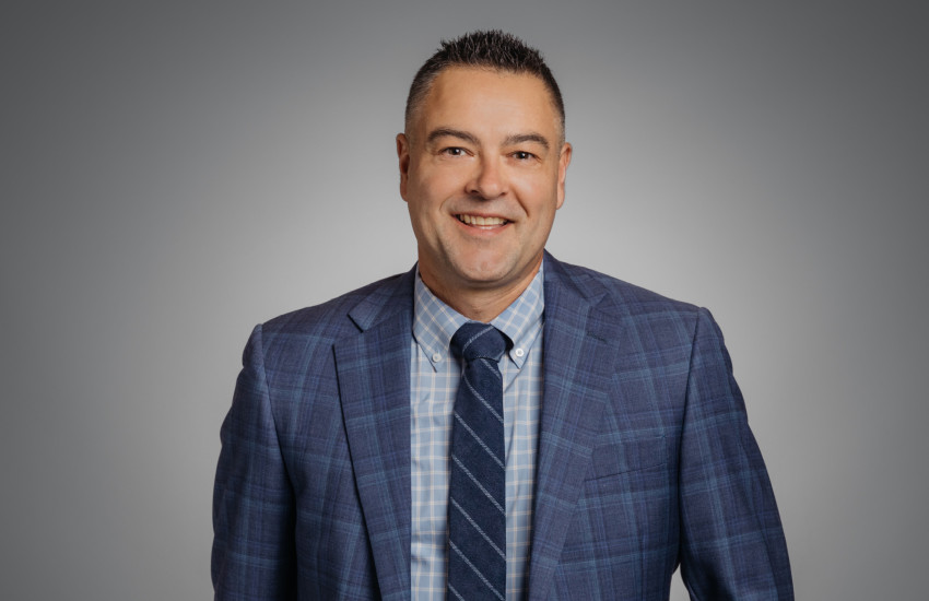 A headshot of Todd Furasek