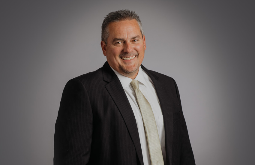 Headshot of Raymond Grace