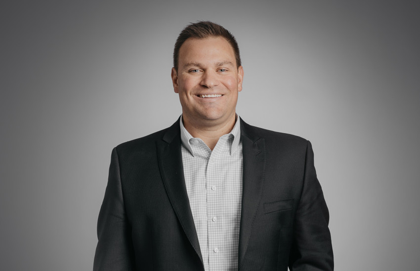 Headshot of Adam Griess