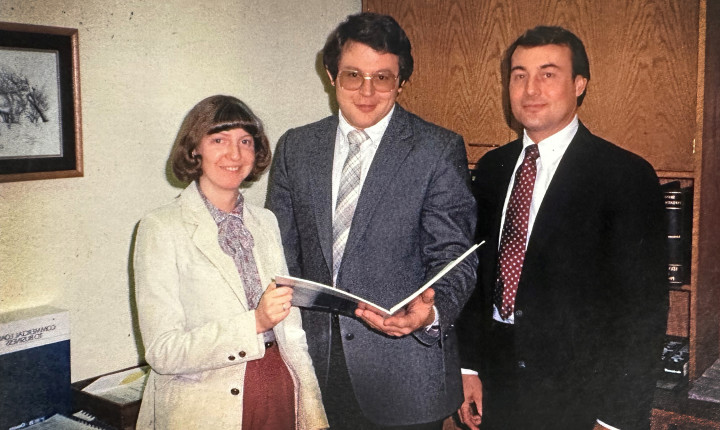 Angie with two men in 1996