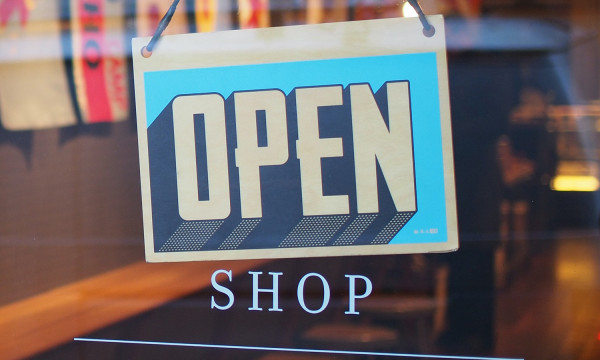An open sign on a storefront