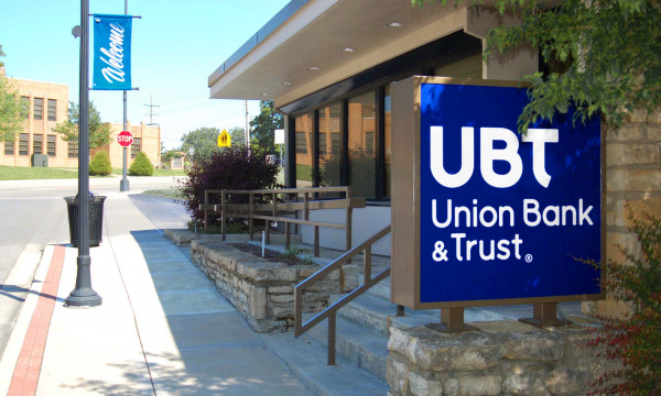 A UBT sign outside of a branch location