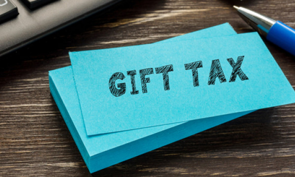 a pad of paper that says gift tax