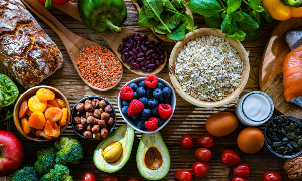 a grouping of vegetables on a cutting board