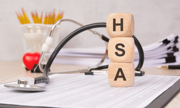 3 wooden blocks stacked on top of each other that say hsa